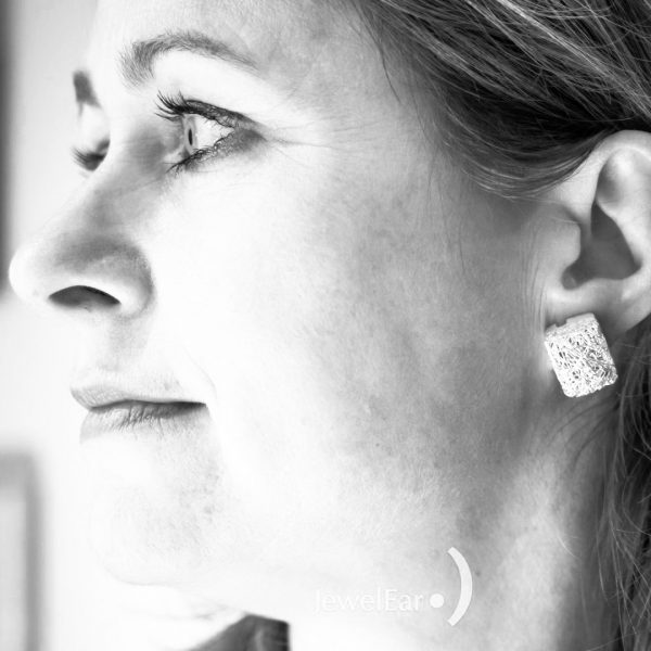 Tinnitus therapie, oorsuizen van JewelEar